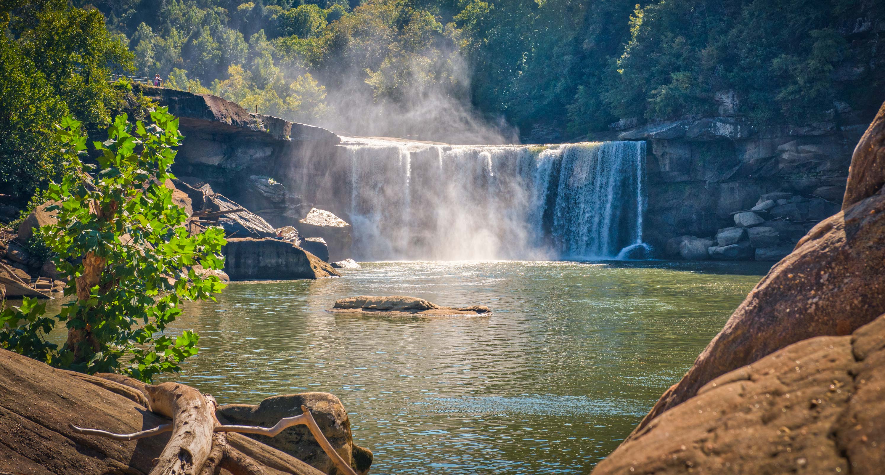 Mist rises from a waterfall in Cumberland Falls State Park.