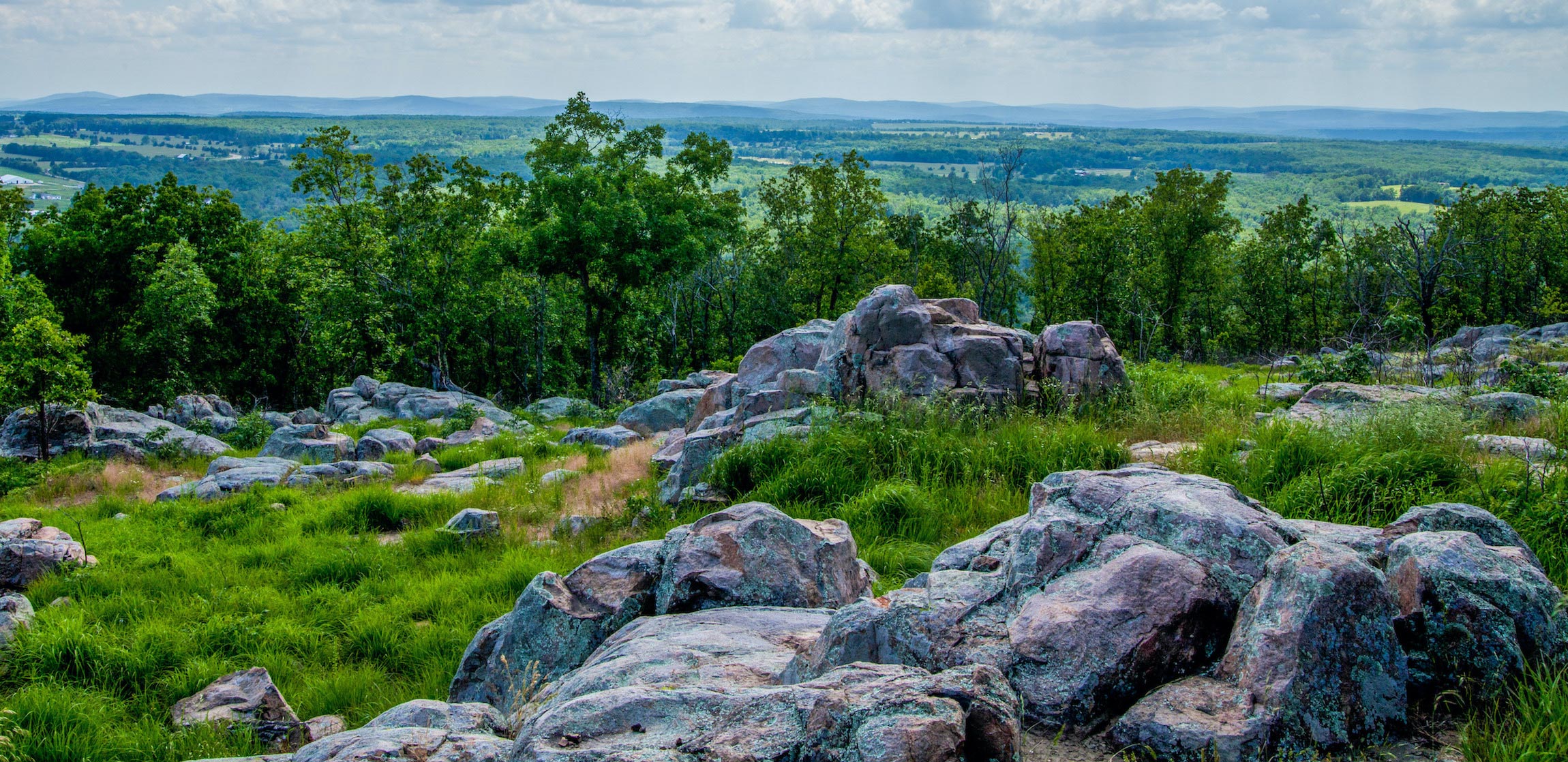Rocks and trees overlooking the horizon in Knob Lick, Missouri.