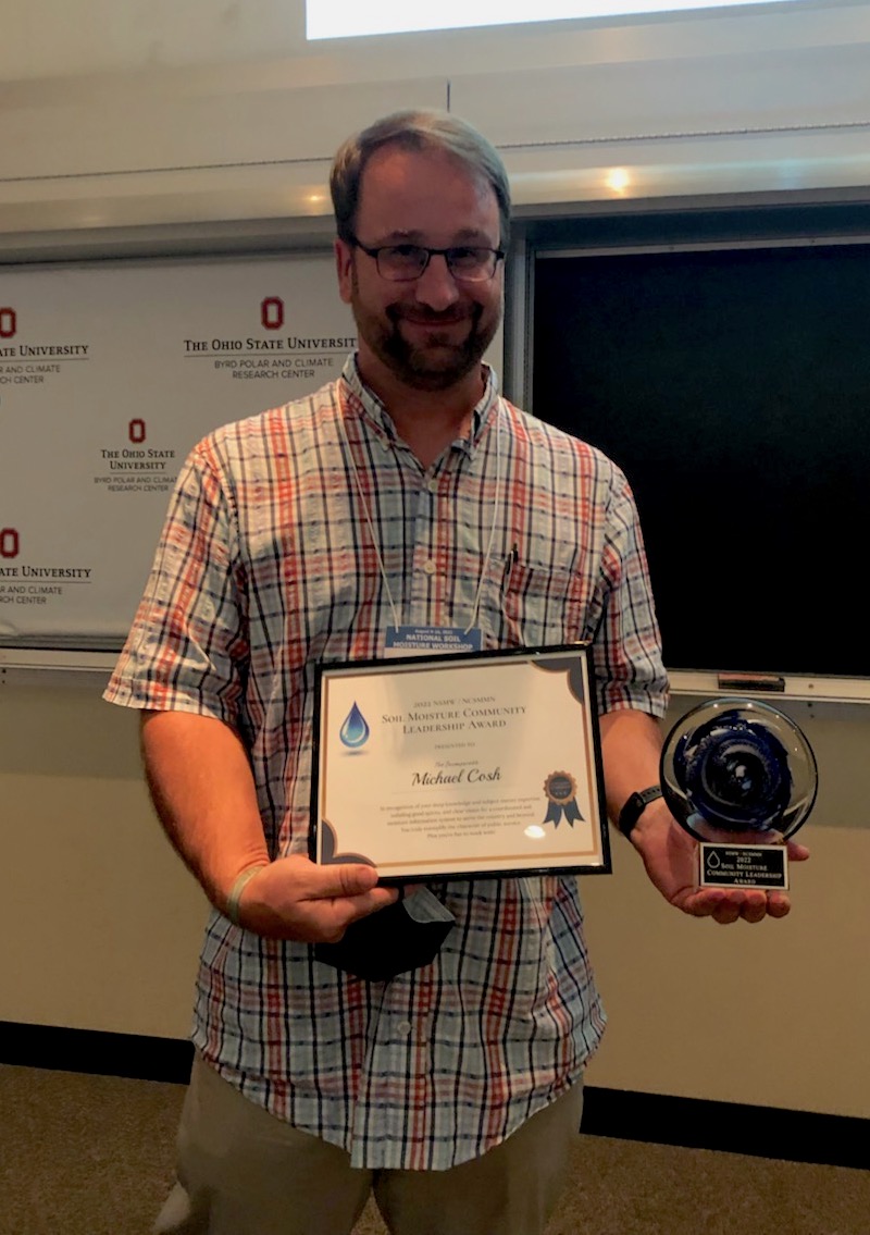 Dr. Michael Cosh accepting the Soil Moisture Community Award