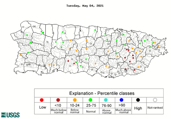 28-day average streamflow levels for Puerto Rico, valid May 4, 2021. Shows  most locations across south, central, and eastern Puerto Rico running below the normal range