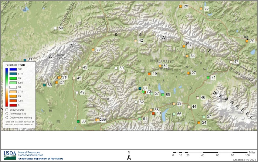A map showing snow water equivalent percentiles for snow course stations zoomed into the Alaska Range and Talkeetna Mountains in Alaska. The scale ranges from 0 (dark red) to 100 (dark blue). Locations with low SWE values are located throughout the south slope of the Alaska Range and also southwest Talkeetna Mountains.