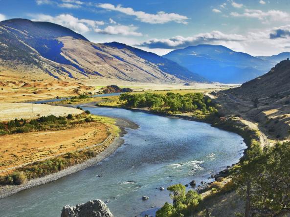 Missouri River flowing through a hilly landscape.