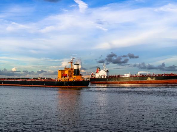 Barges on the Mississippi River, representing drought impacts on shipping and transportation in the Lower Mississippi River corridor.