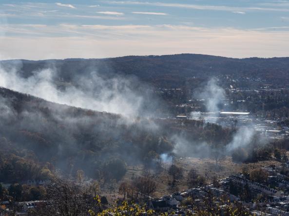Smoke from wildfires on Neversink Mountain in Reading, Pennsylvania. Photo credit: Lee, Adobe Stock.