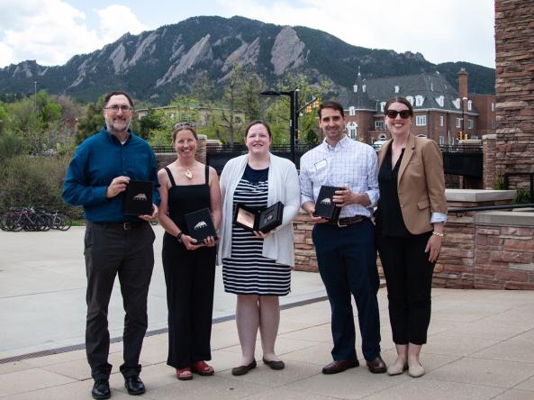 Five CIRES team members with their bronze medal awards for Drought.gov.
