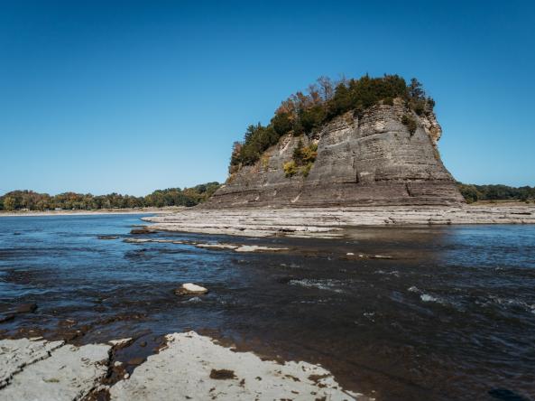 Tower Rock rock protrudes from the the Mississippi River during drought. Source: Cavan, Adobe Stock.