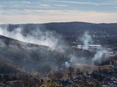 Smoke from wildfires on Neversink Mountain in Reading, Pennsylvania. Photo credit: Lee, Adobe Stock.