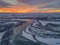 A winter sunset over the Missouri River in Montana. Photo credit: Cordell, Adobe Stock.