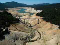 This photo shows California’s largest reservoir, Lake Oroville, nearly dry on August 19, 2014. Credit: California Department of Water Resources.