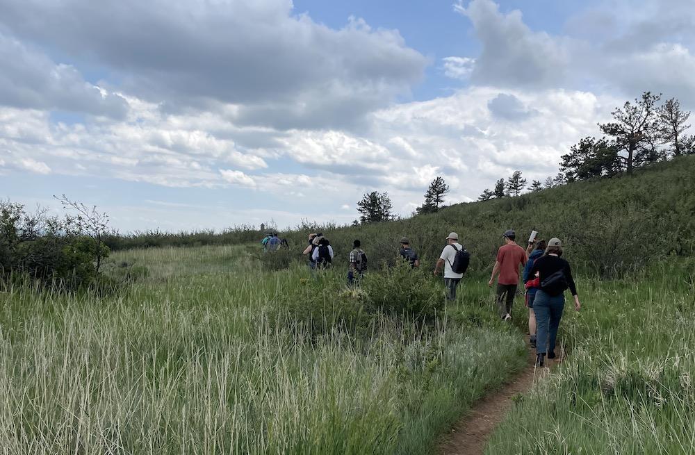 Workshop attendees take a hike during a field trip to Horsetooth Reservoir.