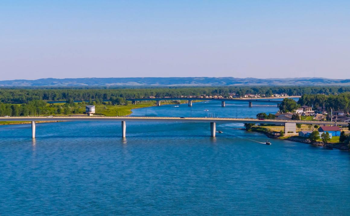 Bismarck city bridges along the Missouri River. Photo credit: PhotoSpirit, Adobe Stock.