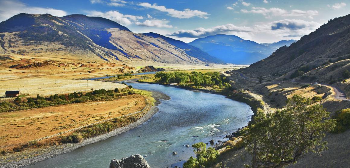 A river flowing through mountains in the Missouri River Basin region