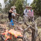 Description: Students and scientists conducting a vegetation survey on a dry sagebrush landscape. 2017. Image Credit: Bill Cotton.