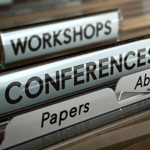 Folders labeled "workshops," "conferences," and "papers"