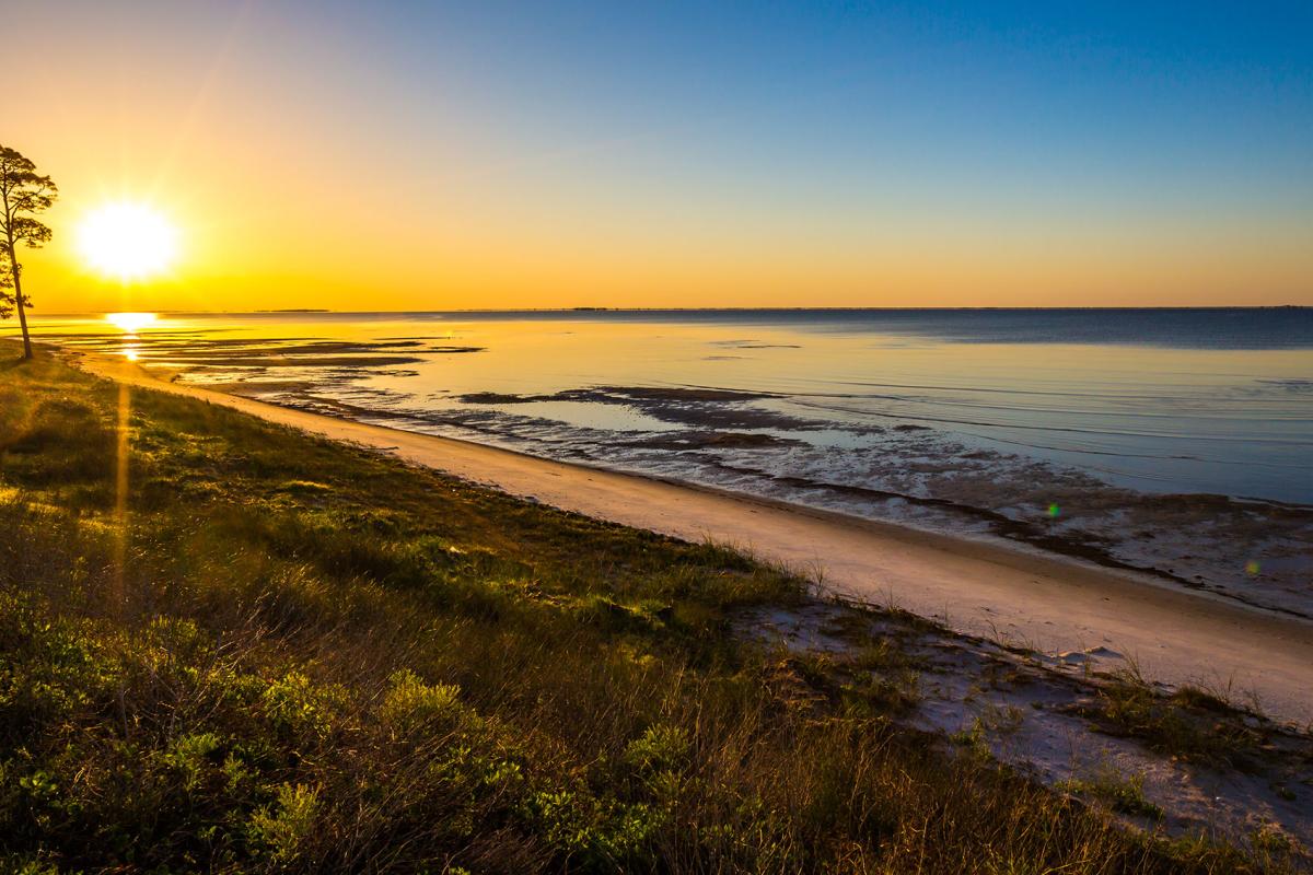 Sunrise over the beach by Apalachicola, Florida
