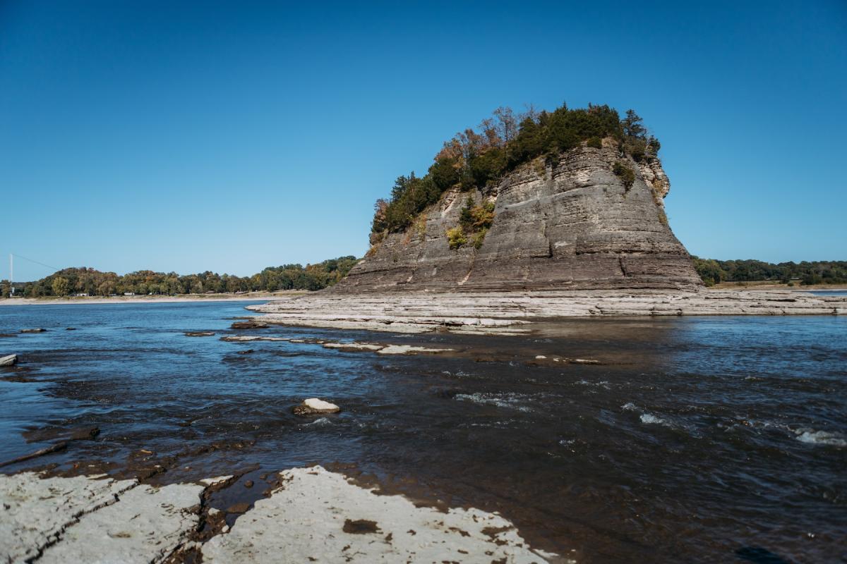 Tower Rock rock protrudes from the the Mississippi River during drought. Source: Cavan, Adobe Stock.